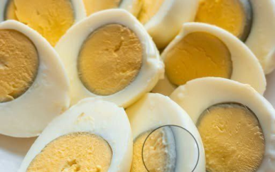 Why does a green ring appear around hard-boiled eggs?