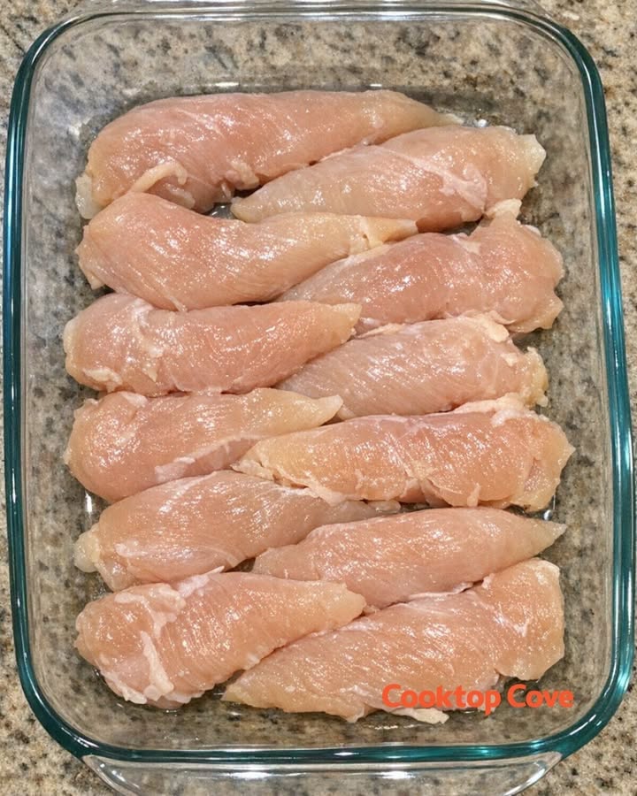 Throw raw chicken tenderloins in the glass casserole dish and 4 simple ingredients to get a meal so delicious your whole family will be begging for more.